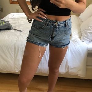 DISTRESSED DENIM SHORTS